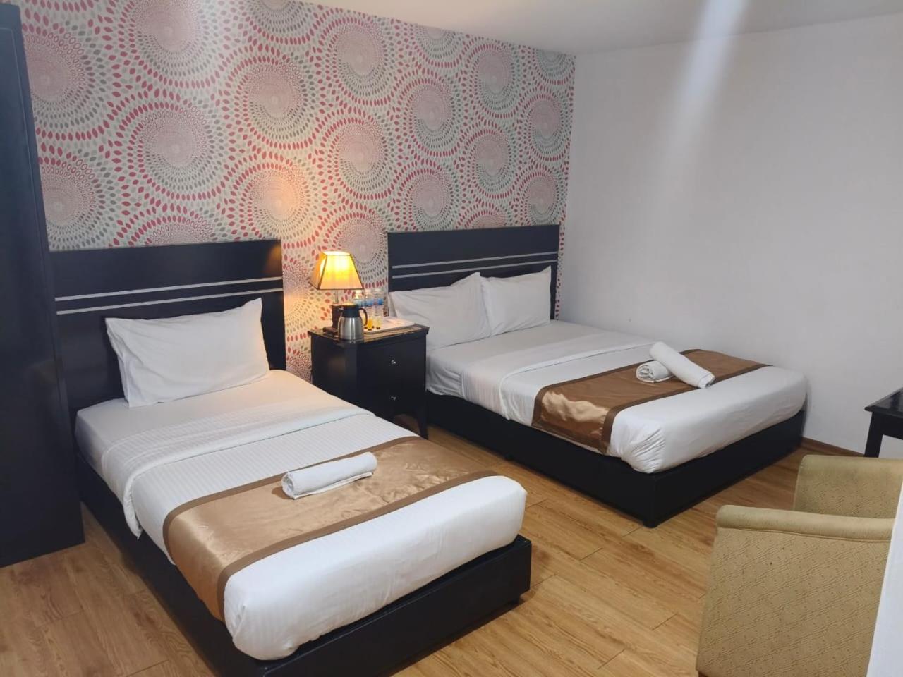 Bluebell Hotel Skudai Bagian luar foto
